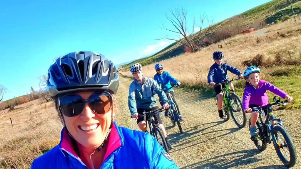 Three generations of a family riding on the the otago rail trail with shebikeshebikes